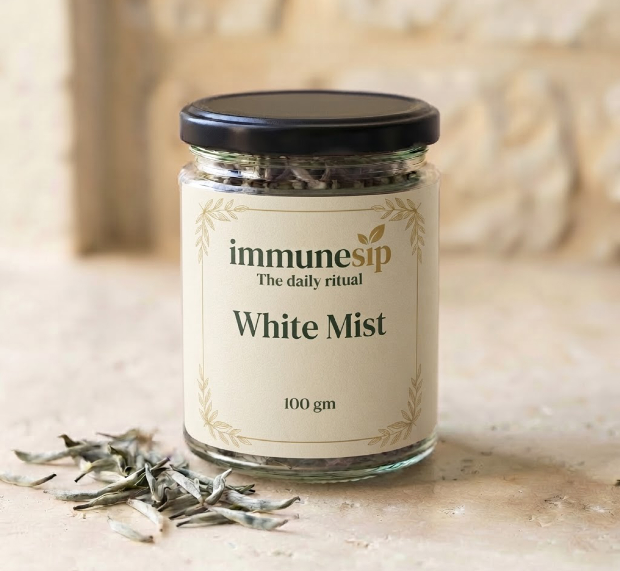 White Mist in a clear glass jar with a black cap